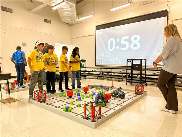 Robotics students at competition. 