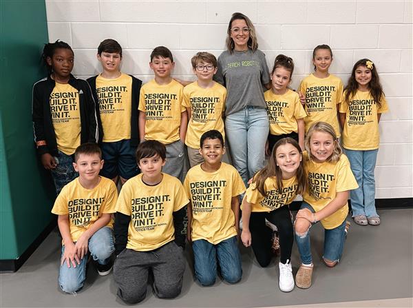 Robotics students at competition. 